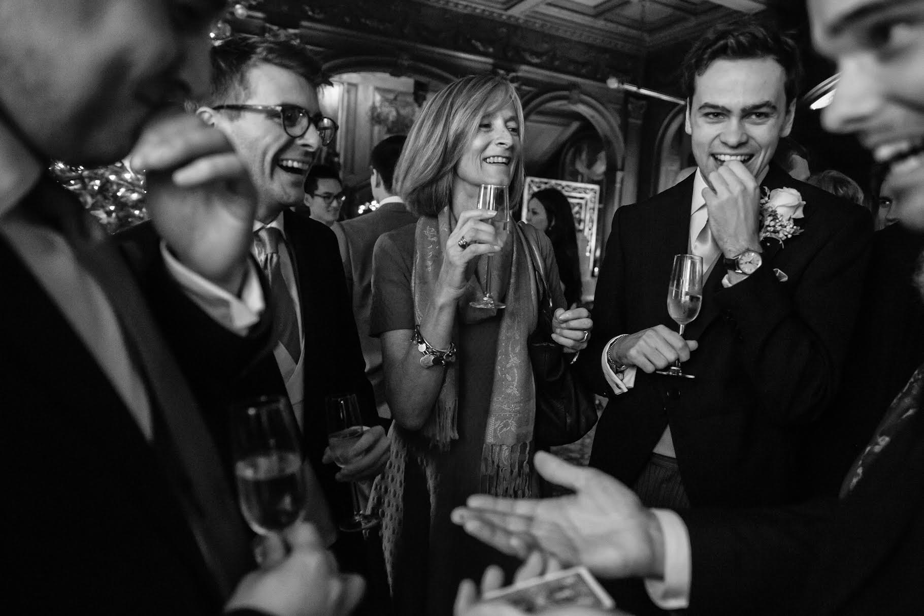 Wedding guests amazed by close-up magic